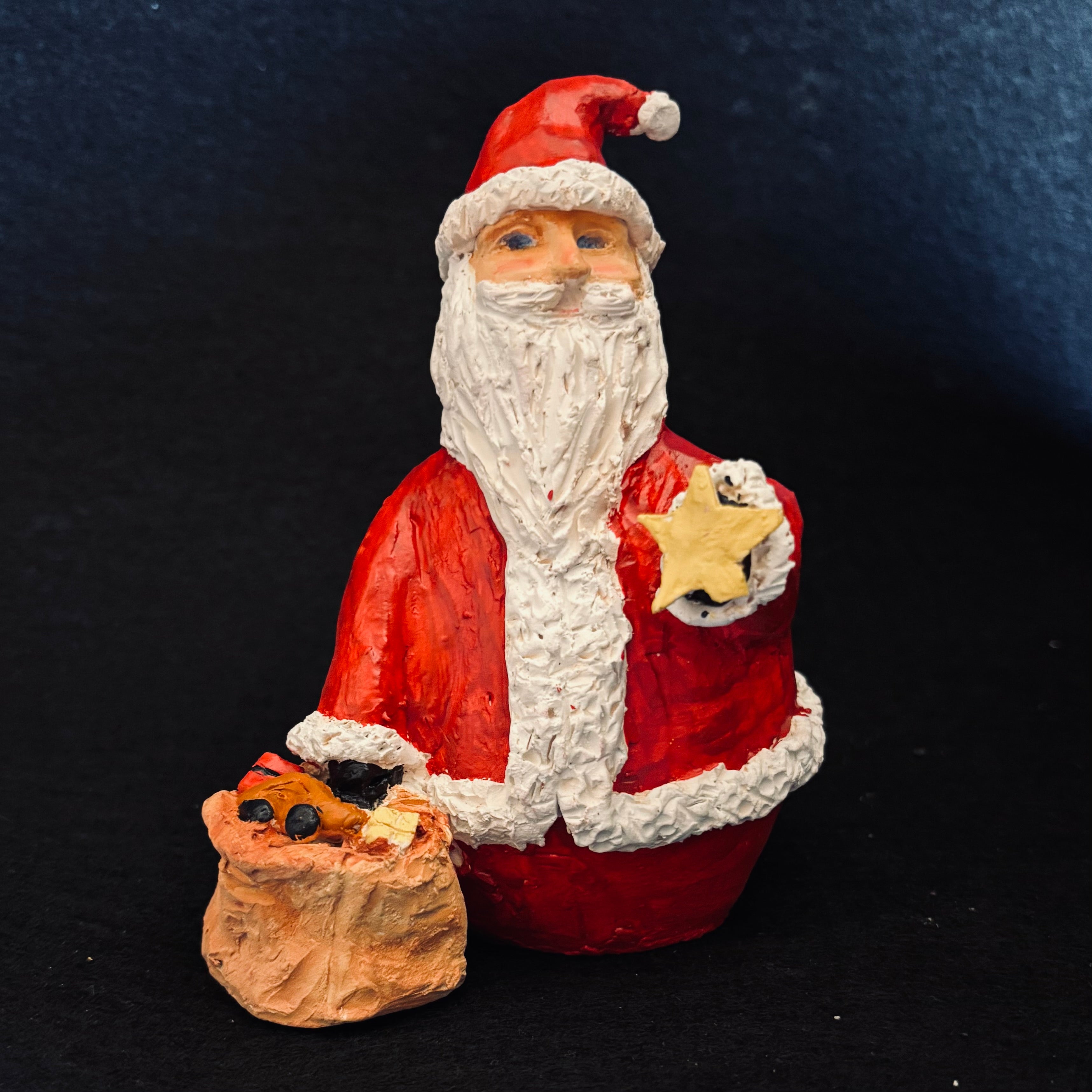#19  santa with toy bag  6"x5"x4"